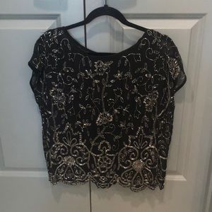 A beautiful beaded Yumi Kim blouse in pristine condition